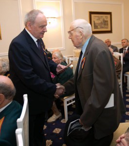 President Nicolae Timofti hands commemorative medal “The 70th anniversary of the victory over fascism in the World War II” to veterans